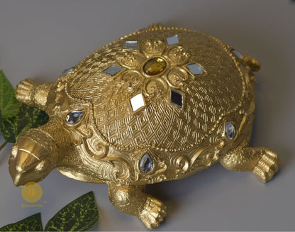 Gold tortoise showpiece from The Gharnish animal figurines collection, ideal for Vastu and decorative purposes.