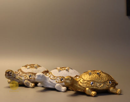 Gold tortoise animal figurine by The Gharnish, a Vastu showpiece for positive energy and decorative display.