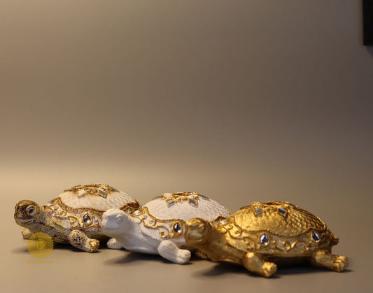 Gold tortoise animal figurine by The Gharnish, a Vastu showpiece for positive energy and decorative display.