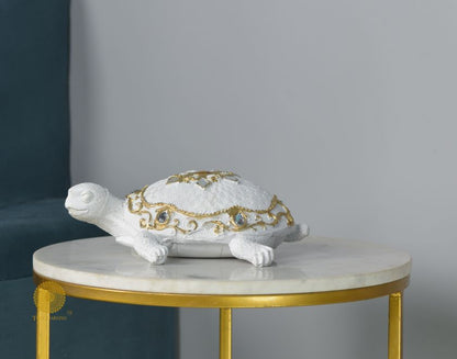 Gold tortoise showpiece by The Gharnish, a Vastu animal figurine for positive energy and decorative display.