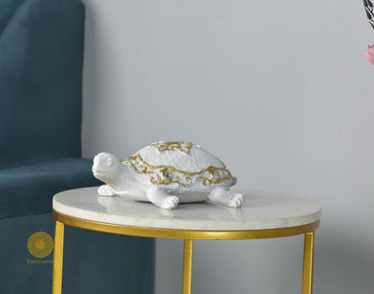 Gold tortoise showpiece from The Gharnish animal figurines collection, perfect for Vastu decoration.