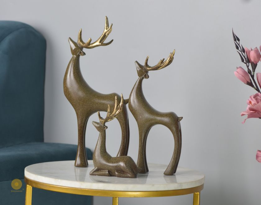 Gray reindeer family figurine by The Gharnish, detailed animal figurine showcasing a reindeer family in a natural pose.