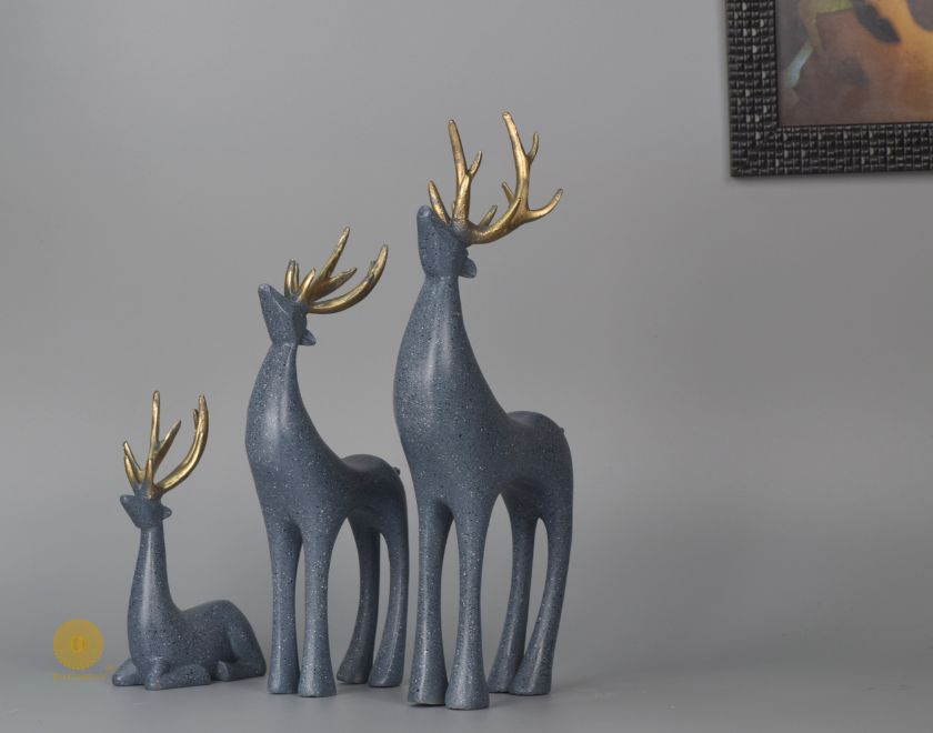 Grey Reindeer Family Figurine by The Gharnish, detailed animal figurines showcasing a family of reindeer in natural pose.