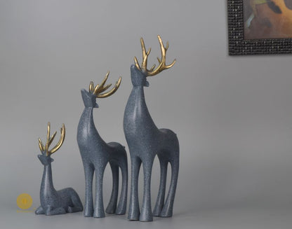 Grey Reindeer Family Figurine by The Gharnish, detailed animal figurines showcasing a family of reindeer in natural pose.