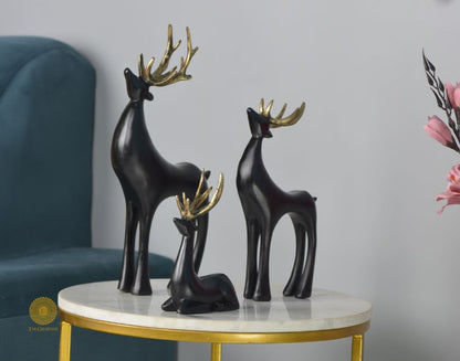 Grey Reindeer Family Figurine by The Gharnish, animal figurine set showcasing a detailed reindeer family for home decor.