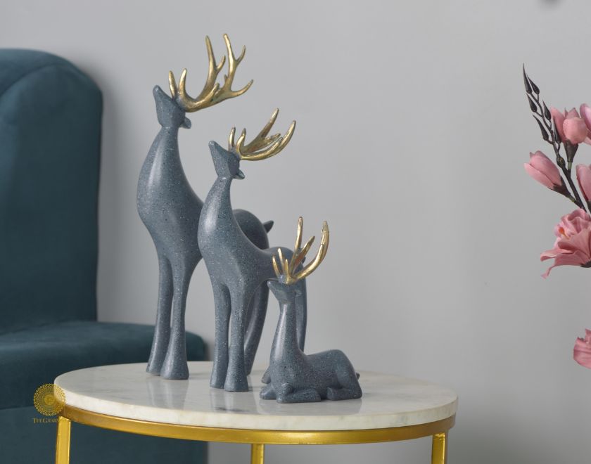 Grey Reindeer Family Figurine from The Gharnish, detailed animal figurines with a family of reindeer in a natural pose.