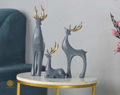 Grey Reindeer Family Figurine by The Gharnish, detailed animal figurines showcasing a festive reindeer family.