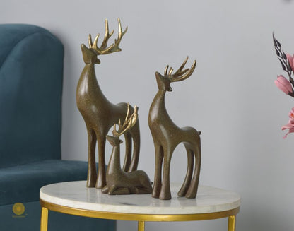 Gray Reindeer Family Figurine by The Gharnish, detailed animal figurines showcasing a festive reindeer family.