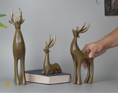 Grey Reindeer Family Figurine by The Gharnish, detailed animal figurines depicting a reindeer family in a realistic style.