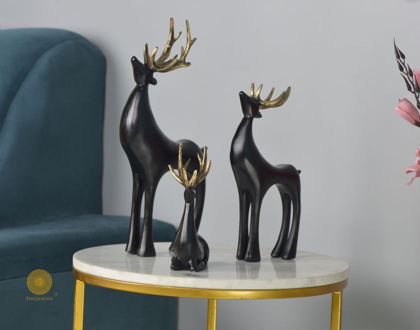 Grey reindeer family figurine from The Gharnish animal figurines collection, showing a detailed reindeer family in a natural setting.