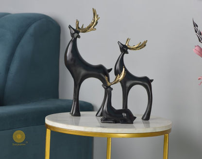 Gray Reindeer Family Figurine by The Gharnish, detailed animal figurines showcasing a festive reindeer family.