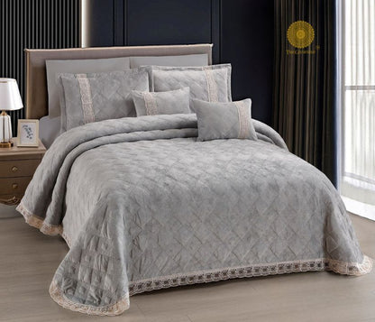 Luxury quilted bedding set by The Gharnish, featuring super soft, premium warmth and a stylish design in a 5-piece collection.