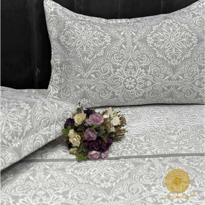 Cally Lilly premium quilted bedding set by The Gharnish, featuring floral patterns on soft, luxurious bedding for a cozy bedroom.