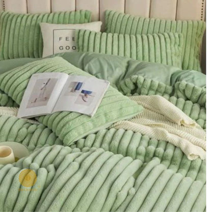 Cream rabbit fur bedding set of 4 from The Gharnish Designer Collection, limited edition luxury bedding for a cozy bedroom.