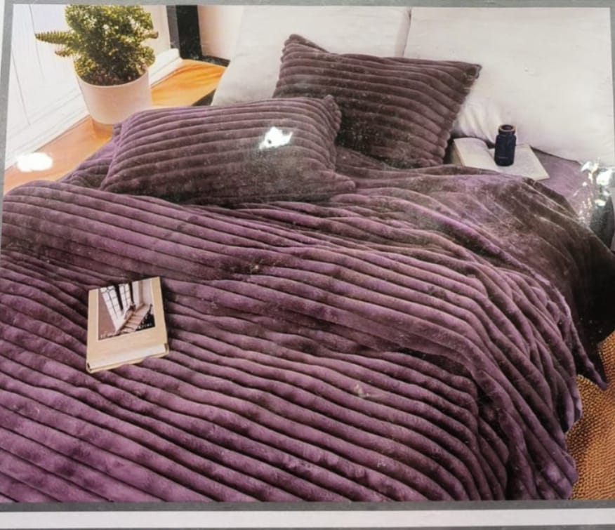 Cream rabbit fur bedding set of 4 from The Gharnish Designer Collection, limited edition, with plush, cozy bedding for a luxurious bedroom.