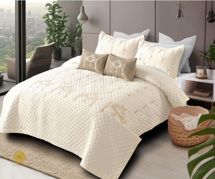 Designer bedding set by The Gharnish featuring a 5-piece summer bedding ensemble with stylish, vibrant fabric and elegant pattern.