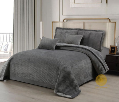 Luxury quilted bedding set by The Gharnish, 5-piece designer bedcover collection with intricate stitching and plush fabric.