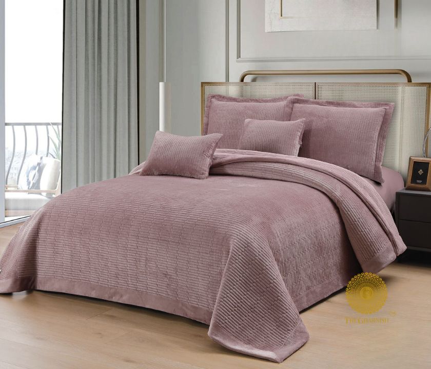 Luxury quilted bedding set by The Gharnish, designer 5-piece bedcover collection with elegant stitching and plush fabric.