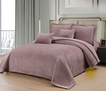 Luxury quilted bedding set by The Gharnish, designer 5-piece bedcover collection with elegant stitching and plush fabric.