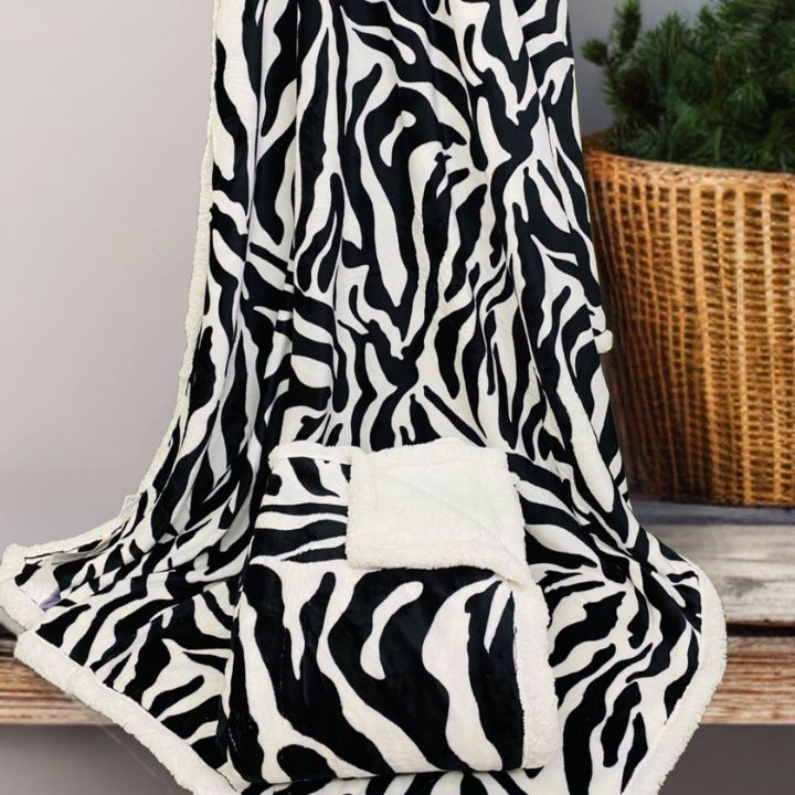 Designer single Sherpa blanket by The Gharnish, featuring soft plush fabric and stylish pattern, perfect for cozy comfort.