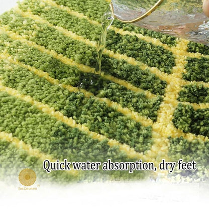Banana leaf-shaped shaded doormat by The Gharnish, 16x32-inch carpet for entryway or bathroom decor.