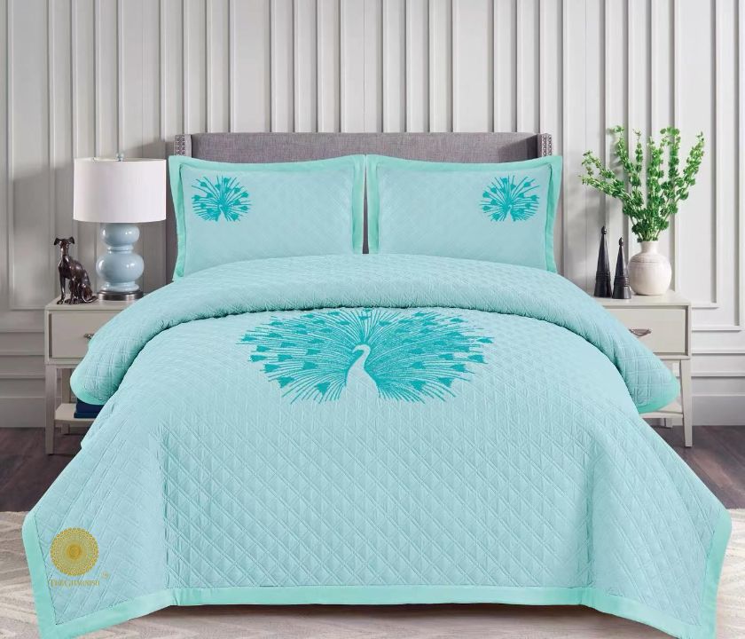 Paradise solid all-season bedding set with embroidery from The Gharnish, featuring soft fabric and decorative stitched design.