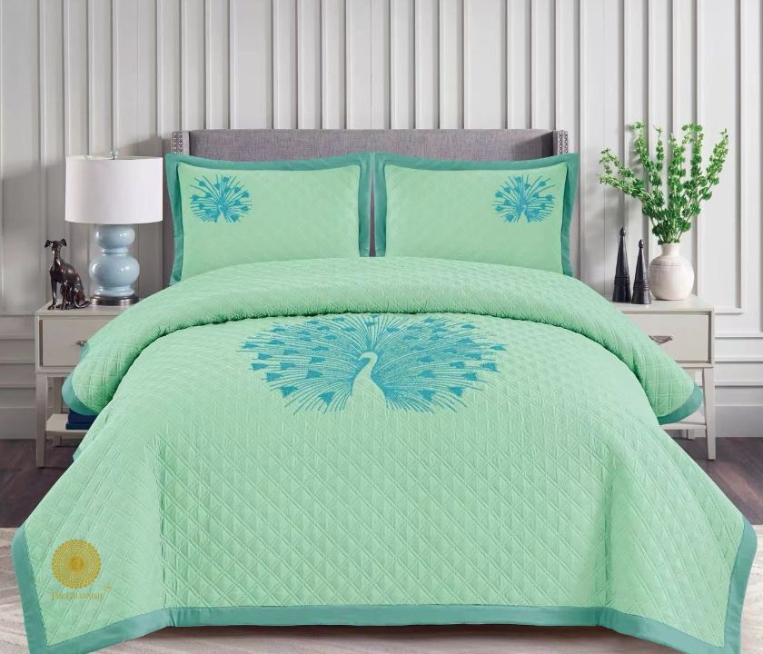 Paradise solid all-season bedding set with embroidery by The Gharnish, featuring soft fabric and decorative stitched patterns.