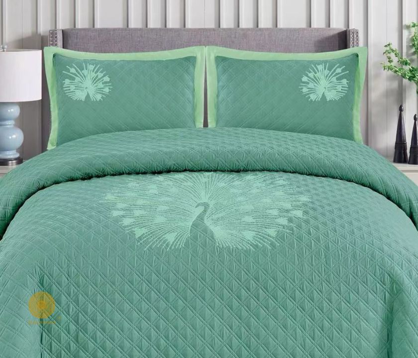 Paradise solid all-season bedding set with embroidery by The Gharnish, featuring soft fabric and detailed stitched patterns.