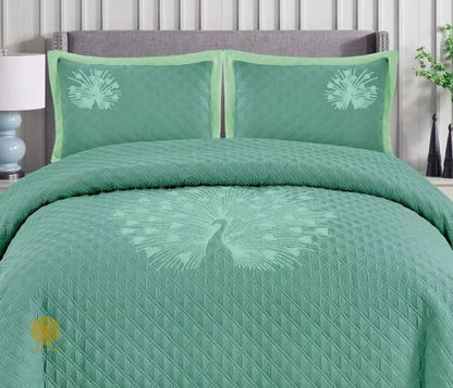 Paradise solid all-season bedding set with embroidery by The Gharnish, featuring soft fabric and detailed stitched patterns.