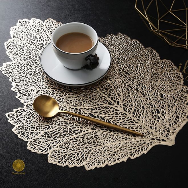 Set of 6 Mapple leaf-shaped storage table mats, 16x16 inches, from The Gharnish by Satkala Creations.