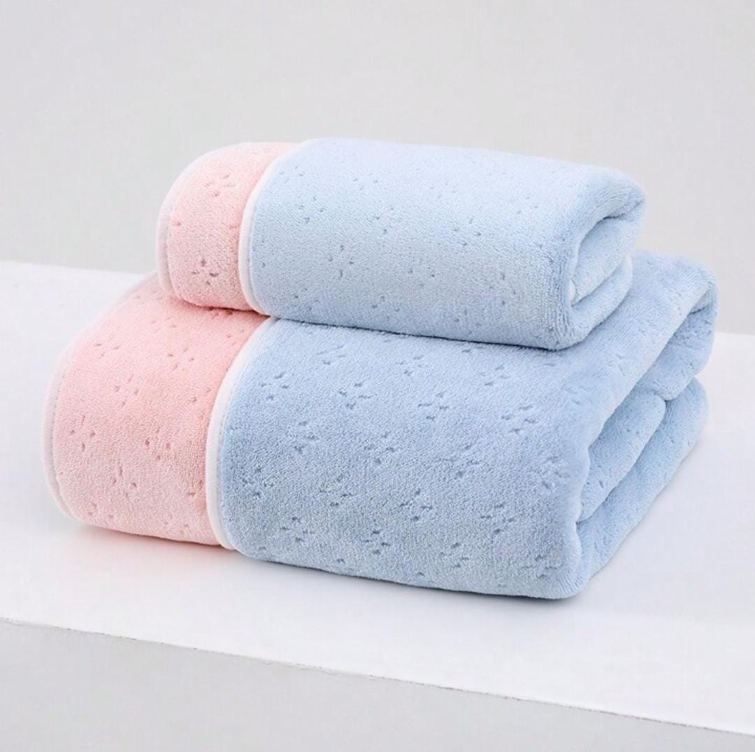 Reversible twin shade bath towel by The Gharnish, soft and plush, suitable for bathroom use, featuring stylish dual-color design.
