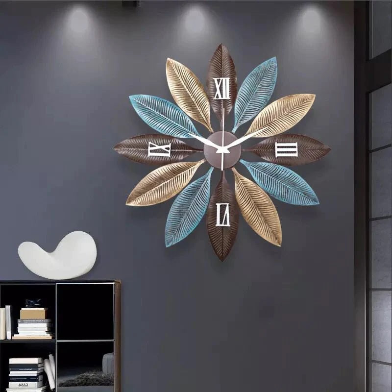 Modern Roman leaf design wall clock by The Gharnish, 30 inches, featuring elegant Roman numerals and leaf-inspired accents.
