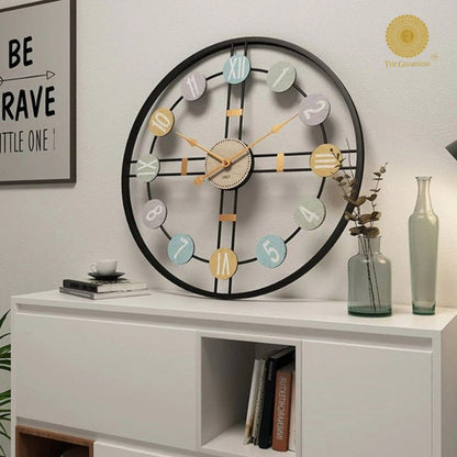 Roman numeric metallic wall clock by The Gharnish, 24-inch diameter, stylish wall clock with metallic finish and bold numerals.