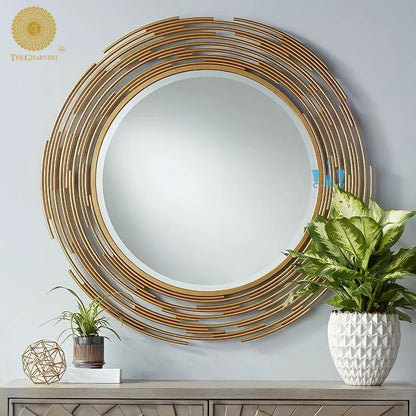 Gold layered pipe wall mirror, 24-inch diameter, decorative mirror with a modern pipe frame design, by The Gharnish.
