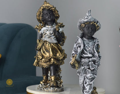 Antique gold abstract walking couple figurines by The Gharnish, 5x15 inches each, showcasing elegant, modern sculpture design.
