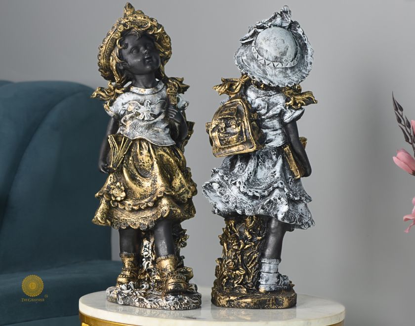 Antique gold abstract walking couple figurines by The Gharnish, 5x15 inches each, showcasing elegant, artistic sculpture details.
