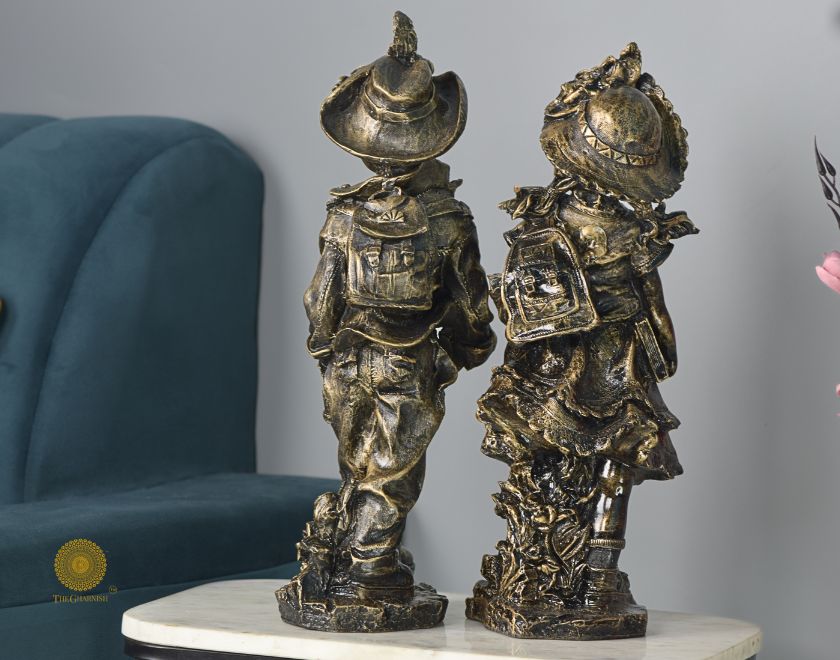 Antique gold abstract walking couple figurines by The Gharnish, 5x15 inches each, featuring elegant, artistic design.
