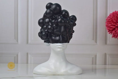 Black modern abstract lady face statue by The Gharnish, stylish decorative figurine for contemporary home decor.