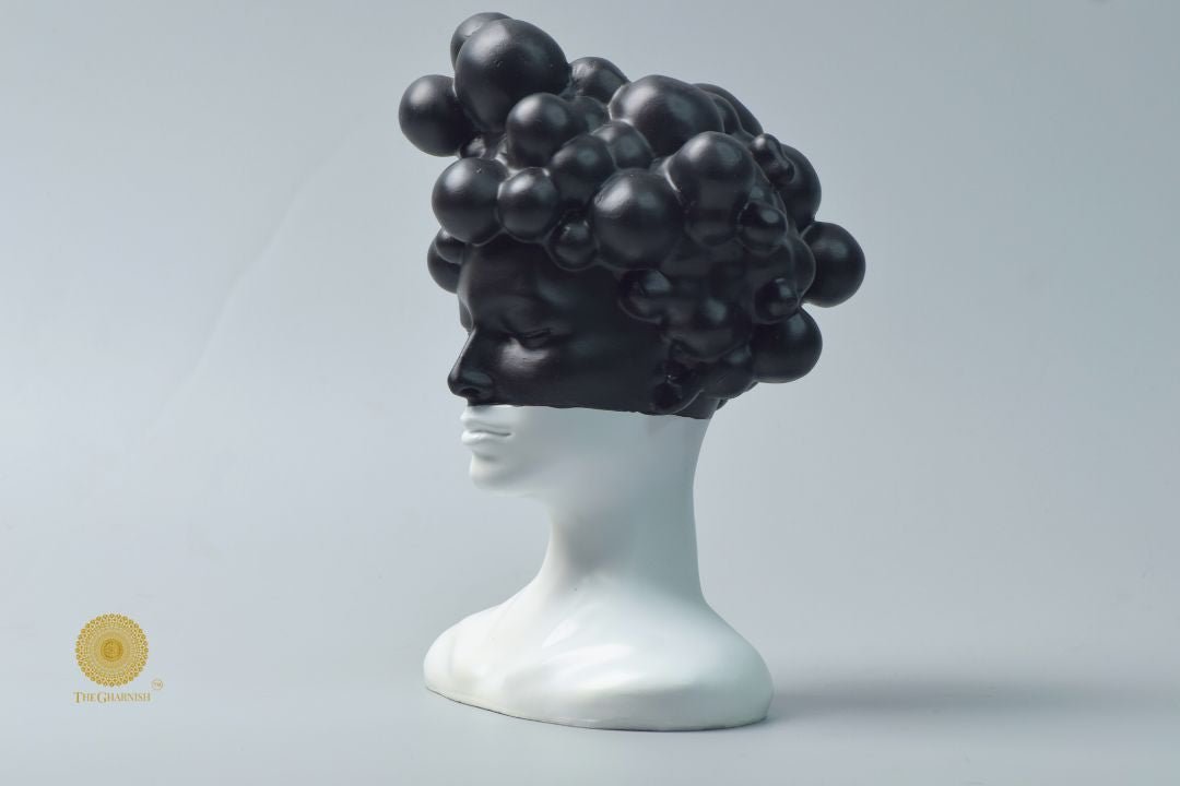 Black modern abstract lady face statue by The Gharnish, stylish decorative figurine for contemporary home decor.