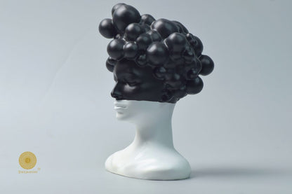 Black modern abstract lady face statue by The Gharnish, stylish decorative figurine for contemporary home decor.