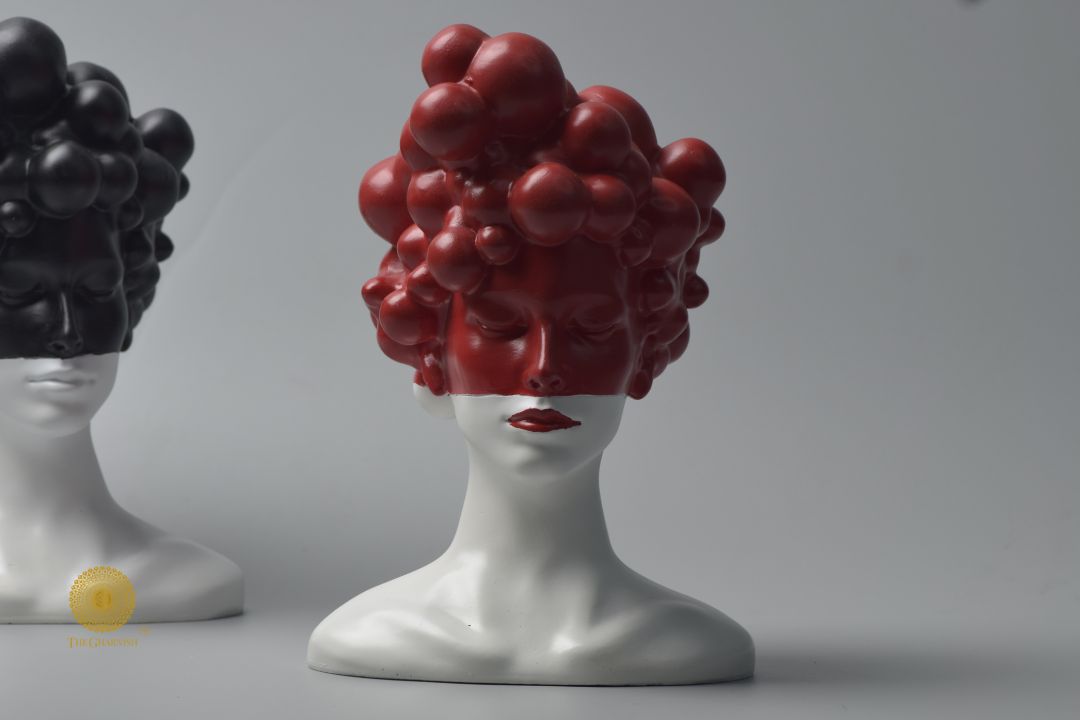 Black modern abstract lady face statue by The Gharnish, stylish and sleek figurine for contemporary home decor.