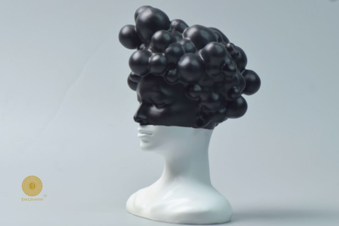 Black modern abstract lady face statue from The Gharnish, stylish figurine with sleek, contemporary design for home decor.