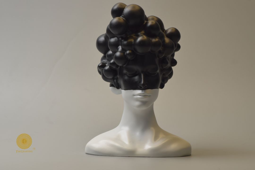 Black modern stylish lady face statue, abstract figurine by The Gharnish, showcasing contemporary art and elegant design.