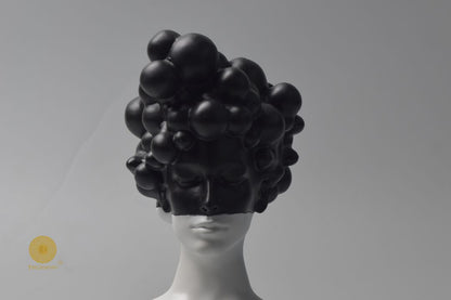 Black modern abstract lady face statue by The Gharnish, stylish and contemporary figurine with elegant facial features.