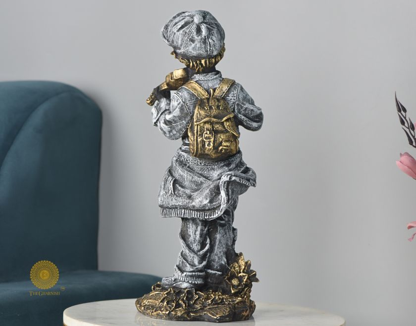 Ancient antique violin boy statue from The Gharnish, 6 x 17 inches, an abstract figurine with a detailed violin-playing boy design.