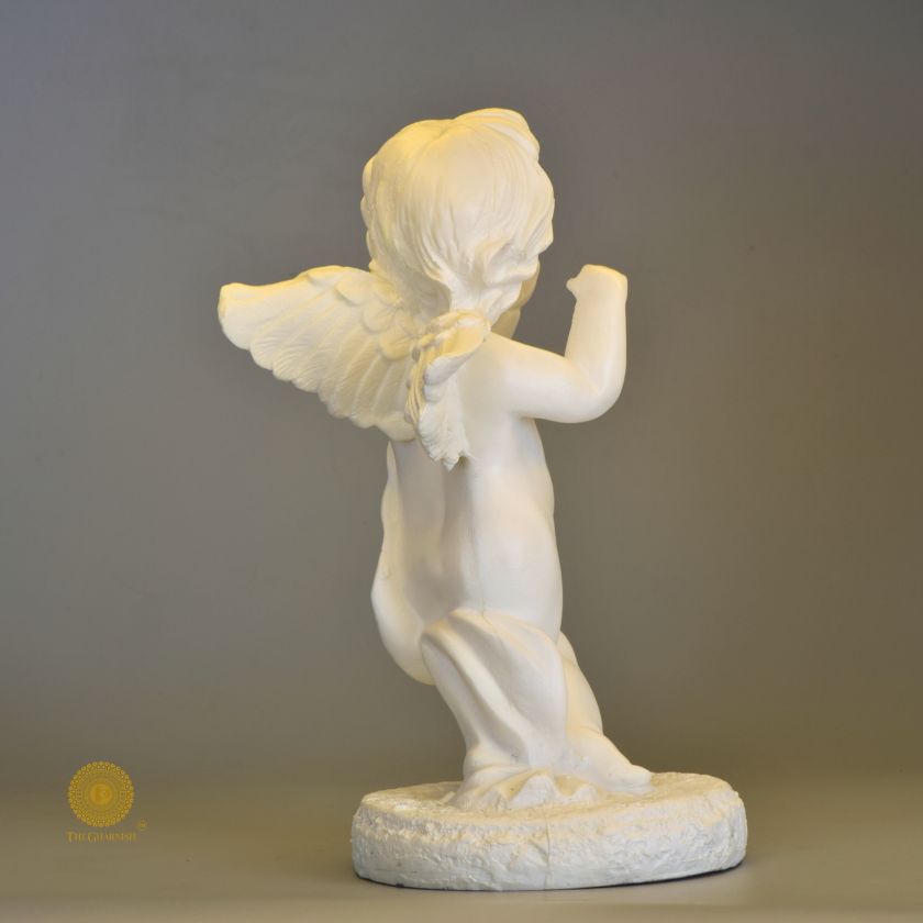 Abstract baby angel statue by The Gharnish, decorative figurine for home and office decor.