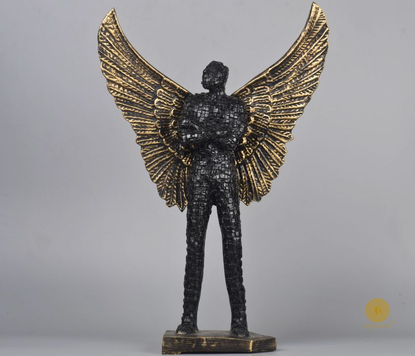 Abstract figurine of a flying wings man statue by The Gharnish, limited edition collectible sculpture with dynamic wing details.