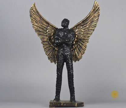 Abstract figurine of a flying wings man statue by The Gharnish, limited edition collectible sculpture with dynamic wing details.
