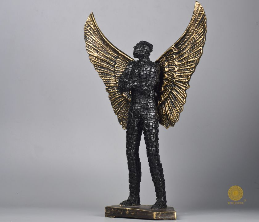 Abstract figurine of a flying wings man statue by The Gharnish, limited edition metal sculpture with intricate details.