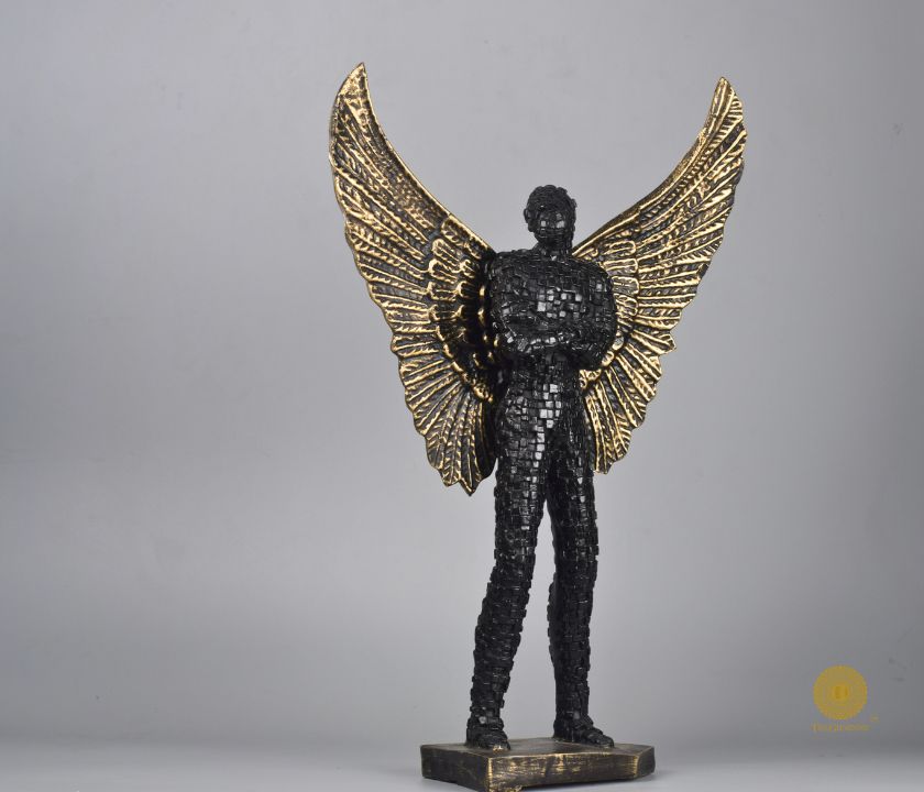 Abstract figurine of a man with flying wings by The Gharnish, limited edition statue showcasing artistic design and craftsmanship.